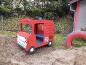 Camion de pompier jeu su ressort
