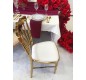 Chaise en métal doré